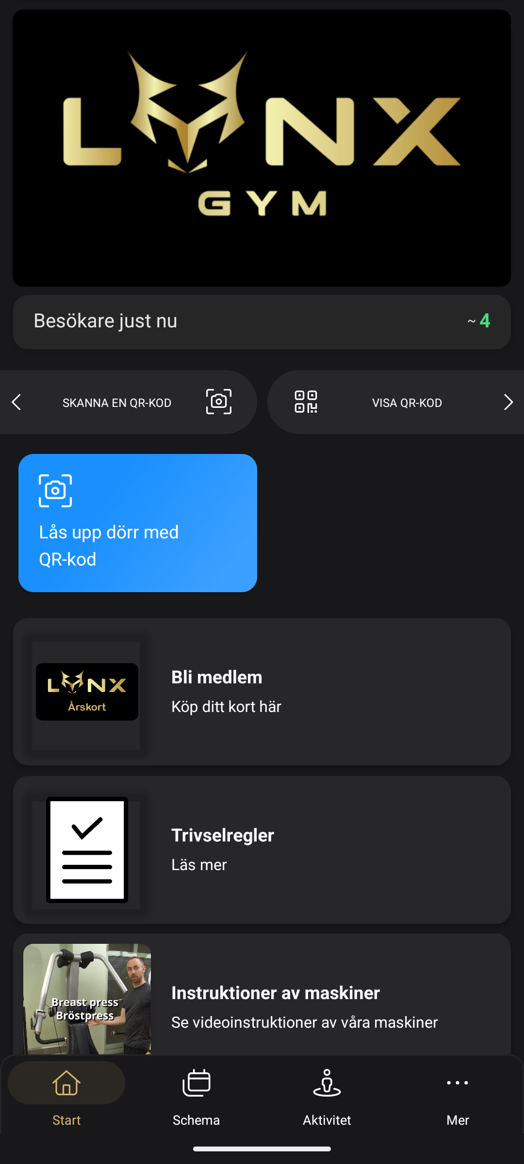 Skärmbild av appen Lynx Gym med den blå knappen Lås upp dörr med QR-kod överst